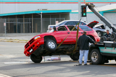 red car being towed