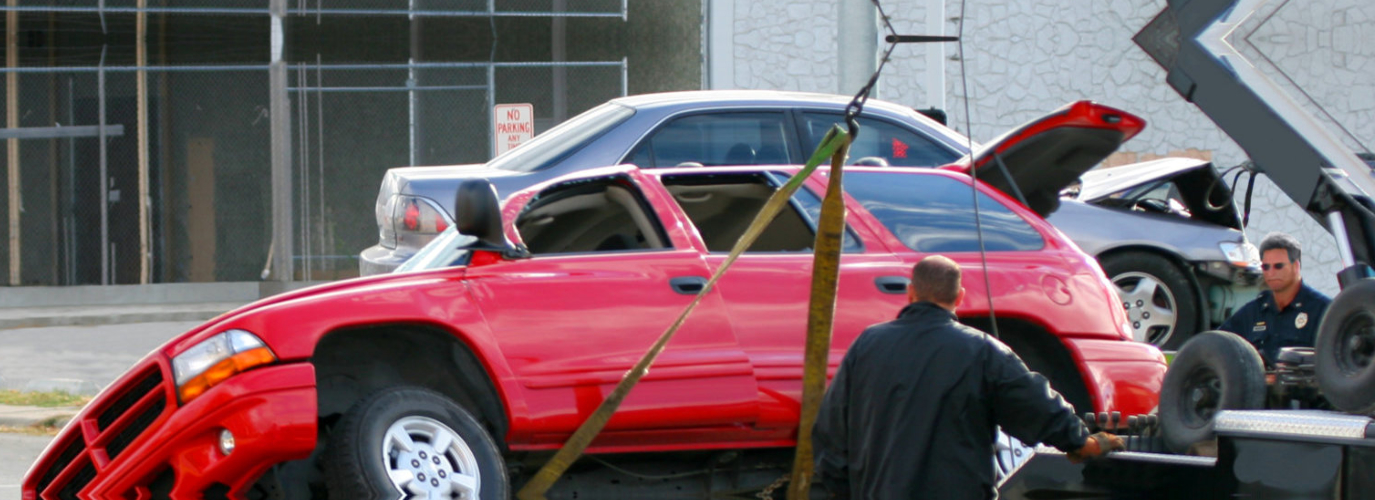 red car being towed